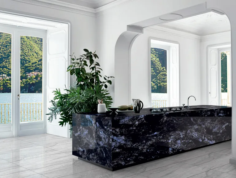 Modern kitchen with a striking dark stone countertop.